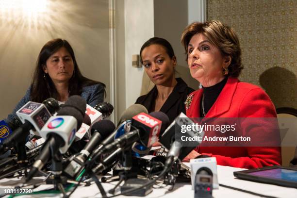 Attorney Gloria Allred , who is representing the family of Edwin Mieses Jr, speaks at a press conference as Dayana Mejia , wife of Mieses, listens...