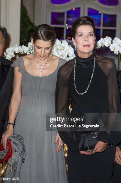 Charlotte Casiraghi and her mother Princess Caroline of Hanover pose as they arrive to attend the AMADE MONDIALE association Gala Dinner at Hotel...