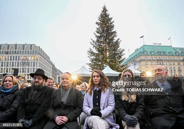 President of the Bundestag Baerbel Bas, Rabbi Yehuda Teichtal, German Chancellor Olaf Scholz, the cousins to German-Israeli Hamas hostage Itay...