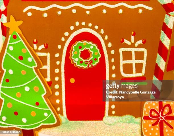 ginger bread house as christmas decoration - gingerbread house cartoon stock pictures, royalty-free photos & images