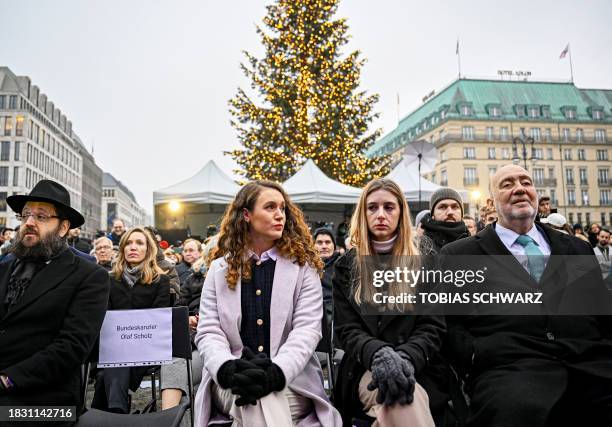 Rabbi Yehuda Teichtal, the cousins to German-Israeli Hamas hostage Itay Svirsky Na'ama Weinberg and Ofir Weinberg, and Israel's ambassador to Germany...