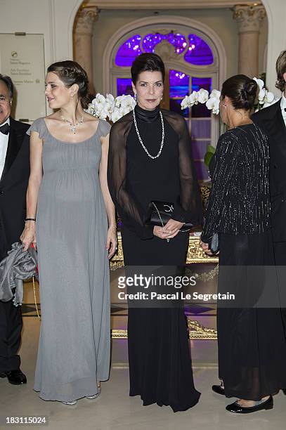 Charlotte Casiraghi and her mother Princess Caroline of Hanover pose as they arrive to attend the AMADE MONDIALE association Gala Dinner at Hotel...