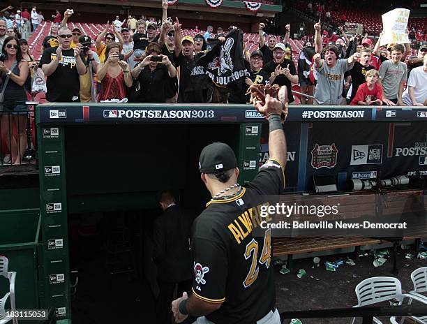 The Pittsburgh Pirates' Pedro Alvarez gets cheers from Pirates fans following a 7-1 victory over the St. Louis Cardinals in Game 2 of the National...