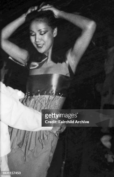 Outtake; Also ran in WWD 4/28/1978 p.64; Guests on the dance floor during a party to celebrate the one year anniversary of Studio 54, with special...