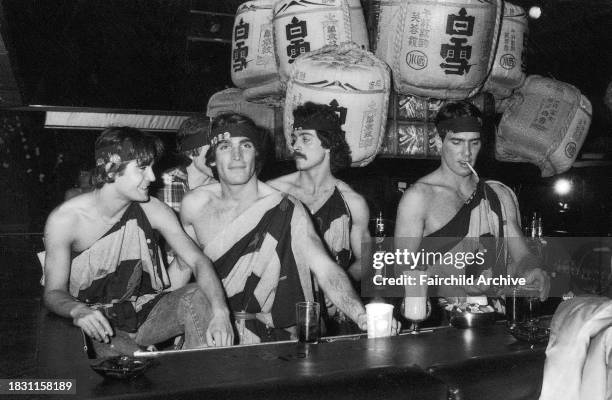 Outtake; Also ran in WWD 4/28/1978 p.64; Behind the bar during a party to celebrate the one year anniversary of Studio 54, with special decorations...