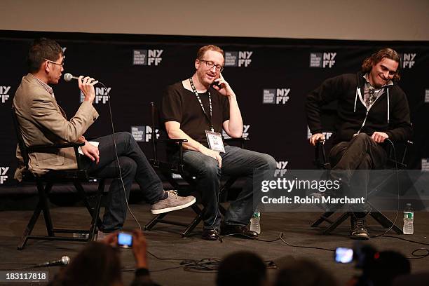 Dennis Lim, filmmakers James Gray and actor Joaquin Phoenix attend the "Immigrants" premiere during the 51st New York Film Festival at The Film...