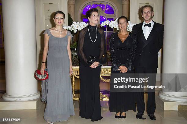 Charlotte Casiraghi, Princess Caroline of Hanover, Princess Stephanie of Monaco and Andrea Casiraghi pose as they arrive to attend the AMADE MONDIALE...