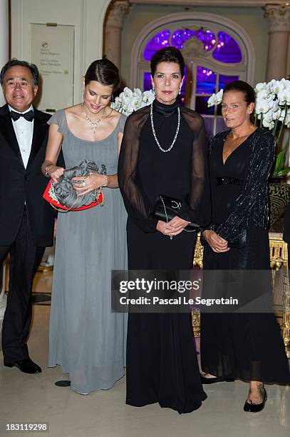 Charlotte Casiraghi, Princess Caroline of Hanover and Princess Stephanie of Monaco pose as they arrive to attend the AMADE MONDIALE association Gala...