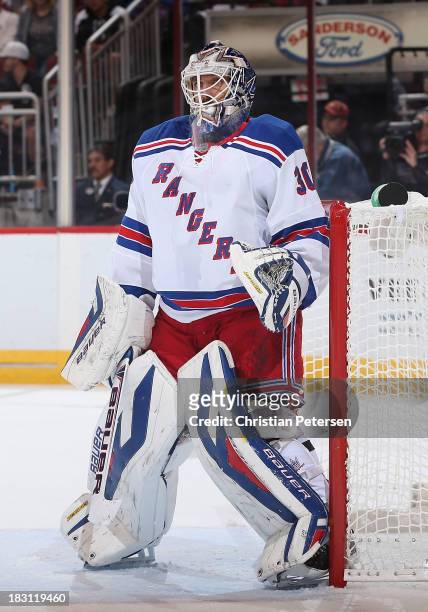 Goaltender Henrik Lundqvist of the New York Rangers in action during the home opening NHL game against the Phoenix Coyotes at Jobing.com Arena on...