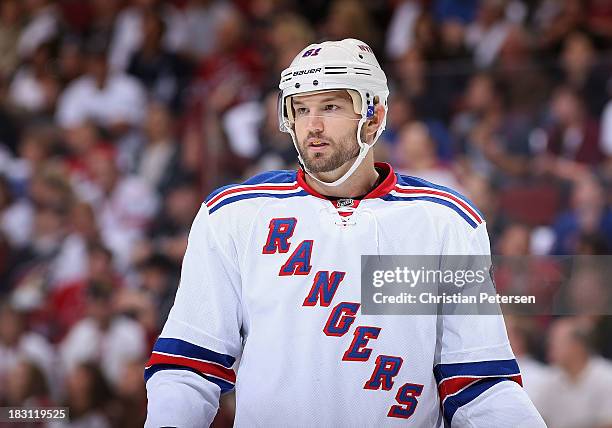 Rick Nash of the New York Rangers in action during the home opening NHL game against the Phoenix Coyotes at Jobing.com Arena on October 3, 2013 in...