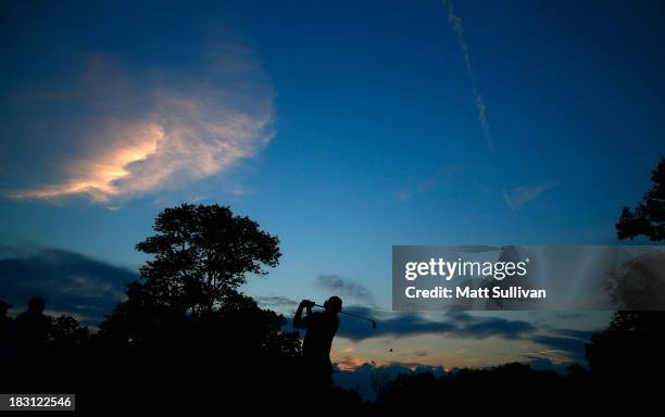 Jason Dufner of the U.S. Team hits his tee shot on the 12th hole during the Day Two Foursome Matches at the Muirfield Village Golf Club on October 4,...