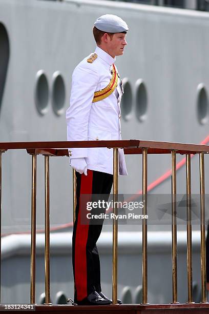 Prince Harry stands guard as he arrives at Garden Island to attend the 2013 International Fleet Review on October 5, 2013 in Sydney, Australia. Over...