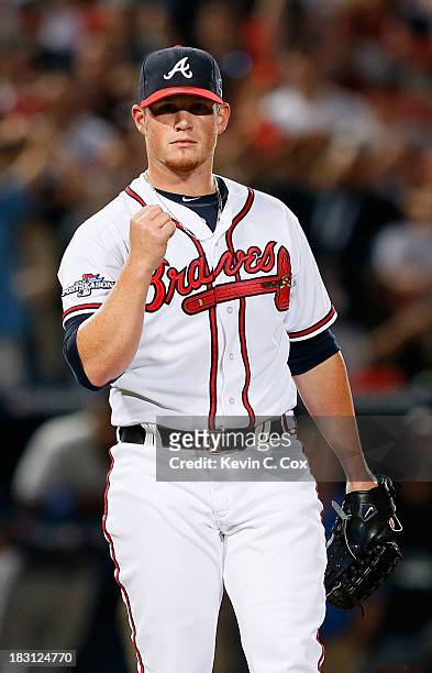Craig Kimbrel of the Atlanta Braves reacts after striking out Carl Crawford of the Los Angeles Dodgers in the ninth inning to end Game Two of the...