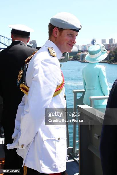 Prince Harry is joined by Governor-General Quentin Bryce, Australian Prime Minister Tony Abbott and Vice Admiral Ray Griggs, Chief of Navy as they...