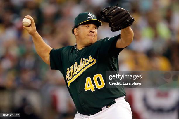 Bartolo Colon of the Oakland Athletics throws a pitch in the first inning against the Detroit Tigers during Game One of the American League Division...