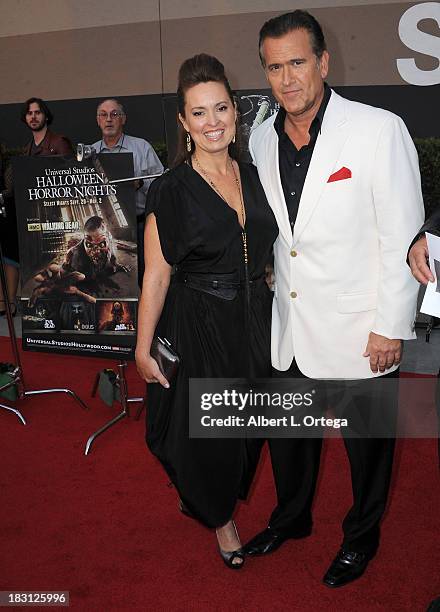 Actor Bruce Campbell and wife/costume designer Ida Gearon attend Universal Studios Hollywood Celebration for "Halloween Horror Nights" With The...