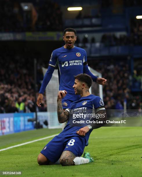 Enzo Fernandez of Chelsea celebrates scoring his second and Chelsea's third goal with Levi Colwill during the Premier League match between Chelsea FC...