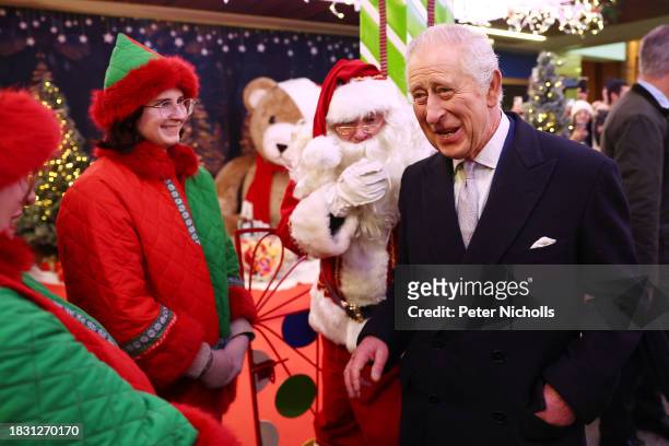 King Charles III visits Ealing Broadway Shopping Centre to tour the Christmas Market, meet local business owners and speak to recipients of The...