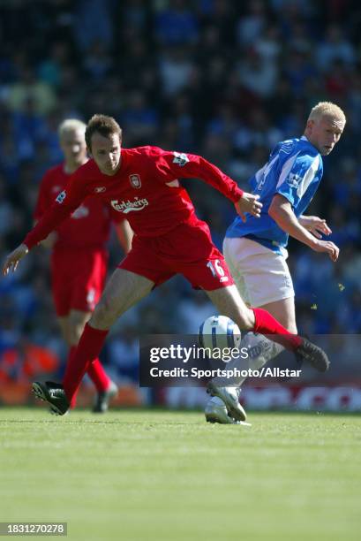 September 24: Dietmar Hamann of Liverpool and Mikael Forssell of Birmingham City challenge during the Premier League match between Birmingham City...