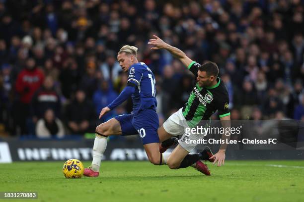 Mykhailo Mudryk of Chelsea is fouled by James Milner of Brighton for a penaltyduring the Premier League match between Chelsea FC and Brighton & Hove...