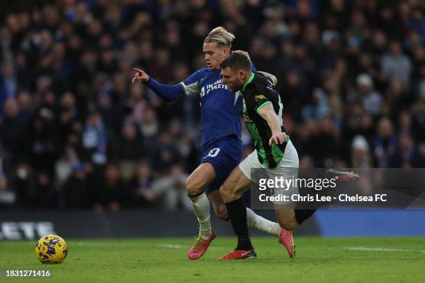 Mykhailo Mudryk of Chelsea is fouled by James Milner of Brighton for a penaltyduring the Premier League match between Chelsea FC and Brighton & Hove...