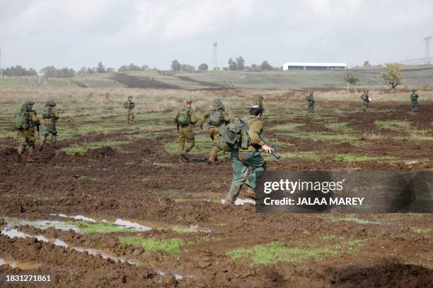 Soldiers of the Israeli army's infantry 6th brigade take part in an assault coordination exercise near Moshav Kidmat Tsvi in the Israel-annexed Golan...