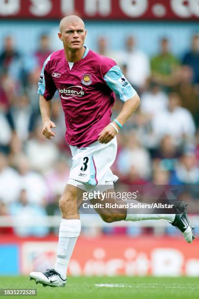 September 24: Paul Konchesky of West Ham United running during the Premier League match between West Ham United and Arsenal at Upton Park on...