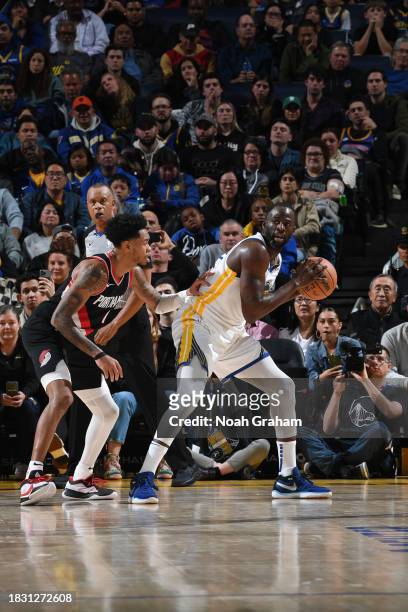 Draymond Green of the Golden State Warriors handles the ball during the game against the Portland Trail Blazers on December 6, 2023 at Chase Center...