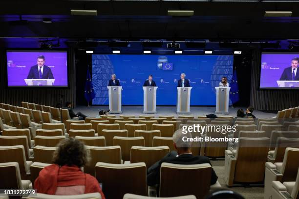 Paolo Gentiloni, economy commissioner of the European Union , from left, Paschal Donohoe, Eurogroup president, middle and Pierre Gramegna, managing...