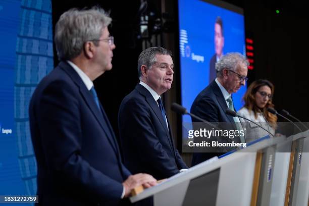 Paolo Gentiloni, economy commissioner of the European Union , from left, Paschal Donohoe, Eurogroup president, middle and Pierre Gramegna, managing...