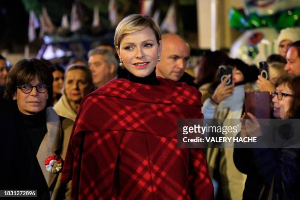 Princess Charlene of Monaco and Princess Stephanie of Monaco attend the inauguration of the Christmas village in Monaco, on December 7, 2023. /...