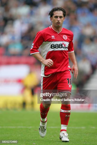 September 18: Fabio Rochemback of Middlesbrough running during the Premier League match between Wigan Athletic and Middlesbrough at Jjb Stadium on...