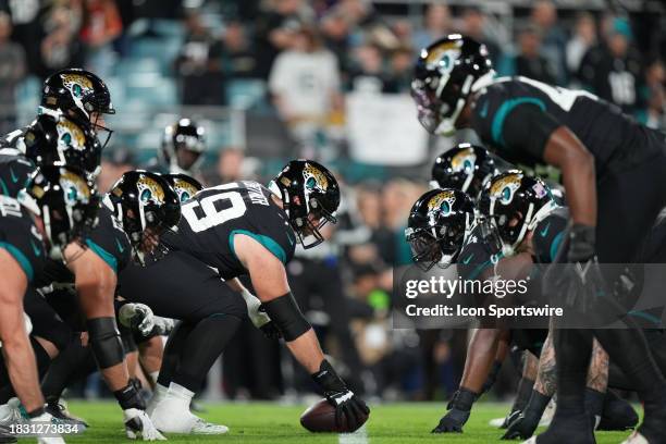 The Jacksonville Jaguars offense and defense face-off in pregame warm-ups before the game between the Cincinnati Bengals and the Jacksonville Jaguars...