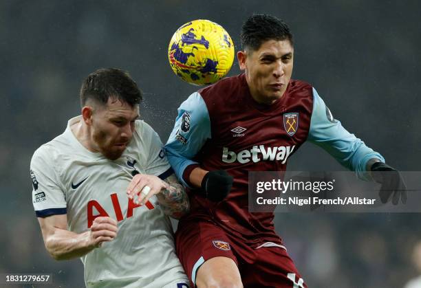 Pierre-Emile Hojbjerg of Tottenham Hotspur and Edson Alvarez of West Ham United challenge during the Premier League match between Tottenham Hotspur...