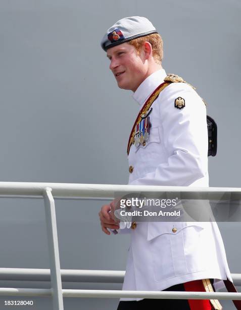 Prince Harry is seen on board the Leeuwin on October 5, 2013 in Sydney, Australia. Over 50 ships participate in the International Fleet Review at...