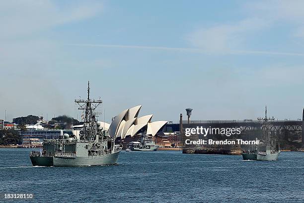 Flotilla of Royal Australian Navy warships enter Sydney Harbour on October 5, 2013 in Sydney, Australia. Over 50 ships participate in the...