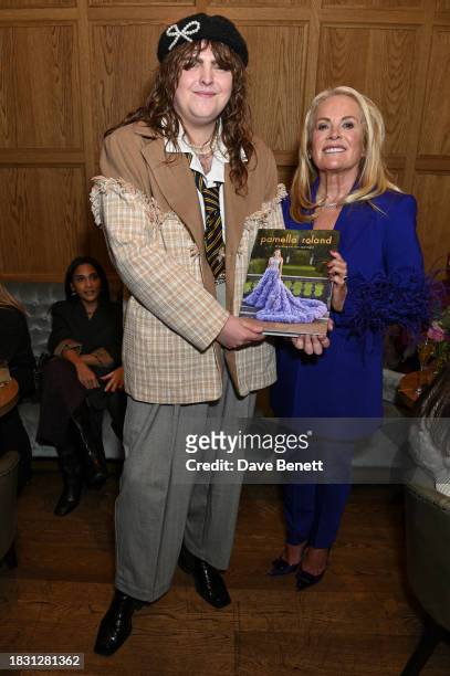 Chandler Tregaskes and Pamella Roland attend a cocktail event hosted by Pamella Roland to celebrate the launch of her "Dressing for the Spotlight"...