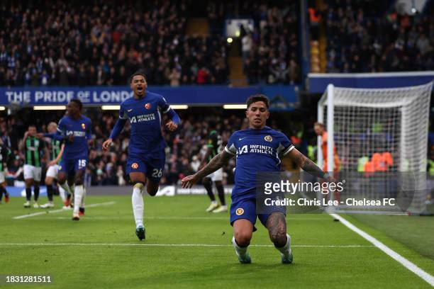Enzo Fernandez of Chelsea celebrates scoring their first goal with Levi Colwill during the Premier League match between Chelsea FC and Brighton &...