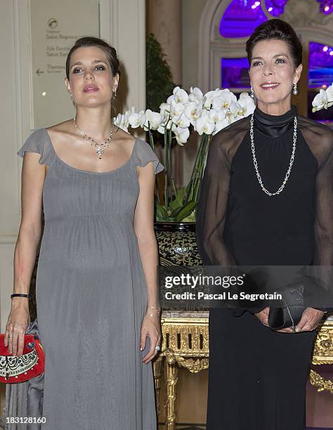 Charlotte Casiraghi and her mother Princess Caroline of Hanover pose as they arrive to attend the AMADE MONDIALE association Gala Dinner at Hotel...