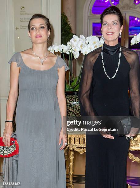 Charlotte Casiraghi and her mother Princess Caroline of Hanover pose as they arrive to attend the AMADE MONDIALE association Gala Dinner at Hotel...