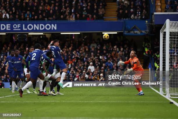 Enzo Fernandez of Chelsea scores their first goal during the Premier League match between Chelsea FC and Brighton & Hove Albion at Stamford Bridge on...