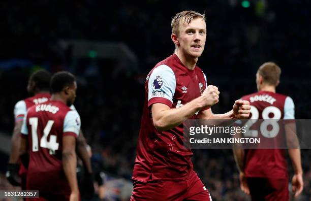 West Ham United's English midfielder James Ward-Prowse celebrates scoring the team's second goal during the English Premier League football match...