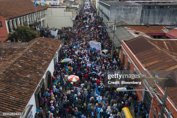 Supporters of Bernardo Arevalo, Guatemala's president-elect, march during a protest in Guatemala City, Guatemala, on Thursday, Dec. 7, 2023....