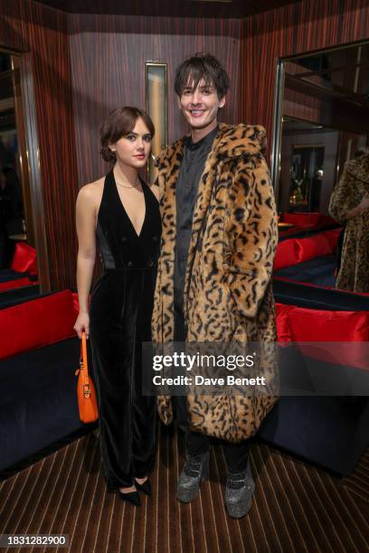 Emilia Jones and Damon Baker attend the Giorgio Armani Crossroads dinner at Isabel on December 7, 2023 in London, England.