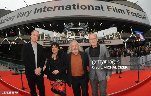 British sales producer Peter Danner, Spanish producer Oria Puy, Spanish film director Montxo Armendariz and Spanish actor Lluis Homar pose on the red...