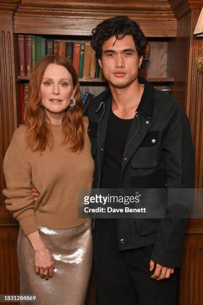 Julianne Moore and Charles Melton attend a screening of "May December" at Soho House on December 7, 2023 in London, England.