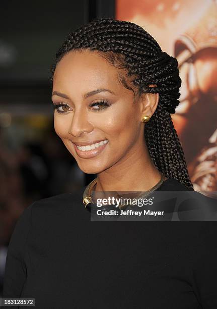 Singer Keri Hilson arrives at the Los Angeles premiere of 'Riddick' at the Westwood Village Theatre on August 28, 2013 in Westwood, California.