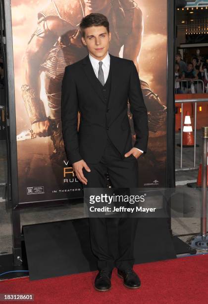 Actor Nolan Gerard Funk arrives at the Los Angeles premiere of 'Riddick' at the Westwood Village Theatre on August 28, 2013 in Westwood, California.