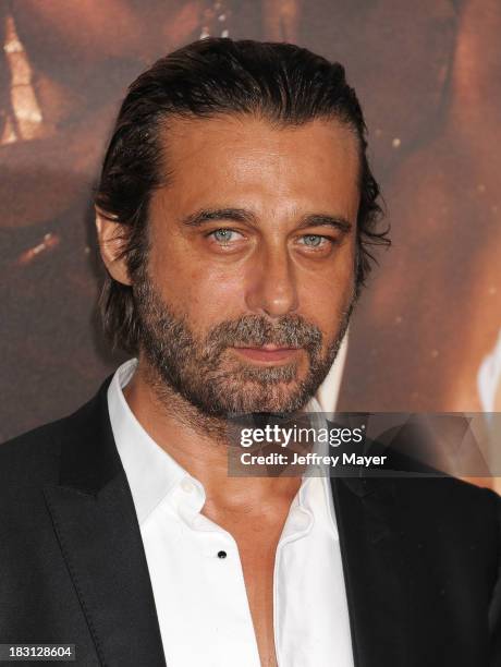 Actor Jordi Molla arrives at the Los Angeles premiere of 'Riddick' at the Westwood Village Theatre on August 28, 2013 in Westwood, California.