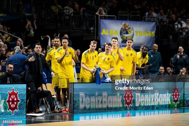The substitute bench of ALBA Berlin celebrates during the match between ALBA Berlin and Anadolu Efes Istanbul on December 7, 2023 in Berlin, Germany.